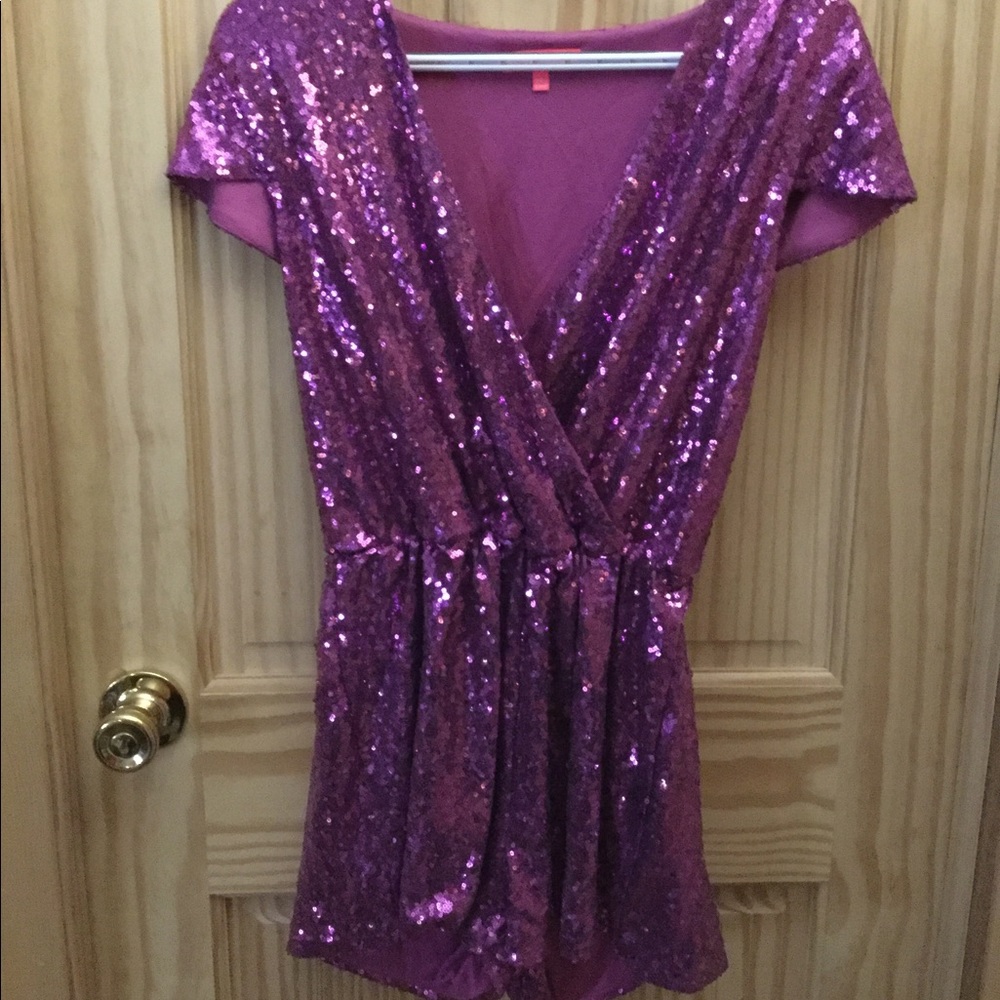 Large purple sequins romper